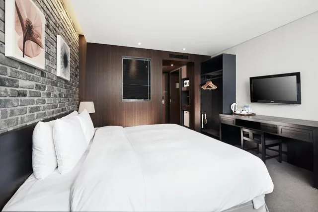 غرفة ديلوكس بسرير مزدوج وسرير فردي، President Hotel Seoul 3/4