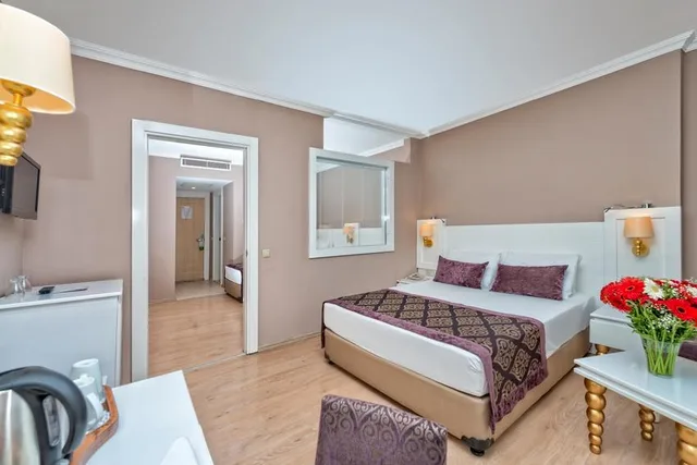 غرفة عائلية بإطلالة على البحر، Serenis Hotel 1/1