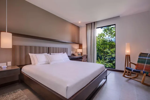 جناح بسرير كينج بغرفة نوم واحدة مع أريكة بمطبخ، Botanika Osa Peninsula, Curio Collection by Hilton 3/8