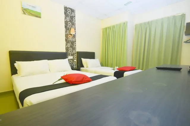غرفة بريميير ثلاثية بسرير مزدوج وسرير فردي، Sastria Hotel 1/4