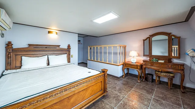 غرفة بسرير كوين مع أريكة، Eastern Castle Pension 1/4