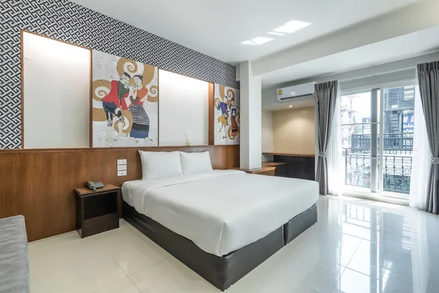 غرفة ديلوكس بسرير كينج مع أريكة، COZYTEL CHIANGMAI 2/5