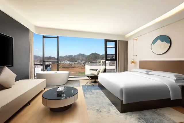 غرفة ديلوكس تنفيذية بسرير كينج، Days Inn by Wyndham Enshi Gaoping 1/1