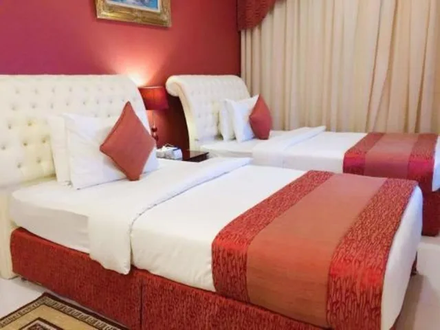 جناح استوديو بسريرين منفصلين، Al Maha Regency Hotel Suites 9/10