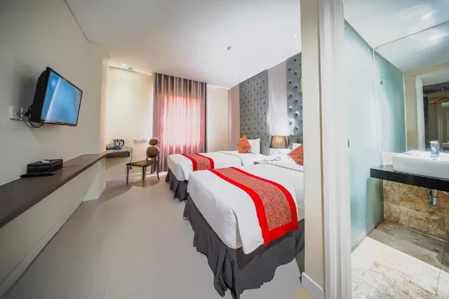 غرفة غراند ديلوكس بسريرين منفصلين، Serela Cihampelas by KAGUM Hotels 1/1