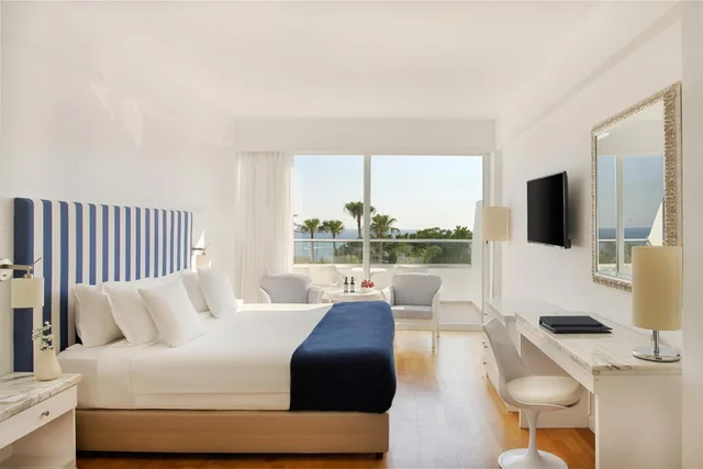 استوديو بسرير كينج بإطلالة على البحر مع أريكة، Grecian Sands Hotel 1/1