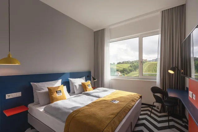 غرفة قياسية بسرير كينج وسرير كوين لذوي الإعاقة، Holiday Inn - the niu, Form Stuttgart Feuerbach, an IHG Hotel 2/6