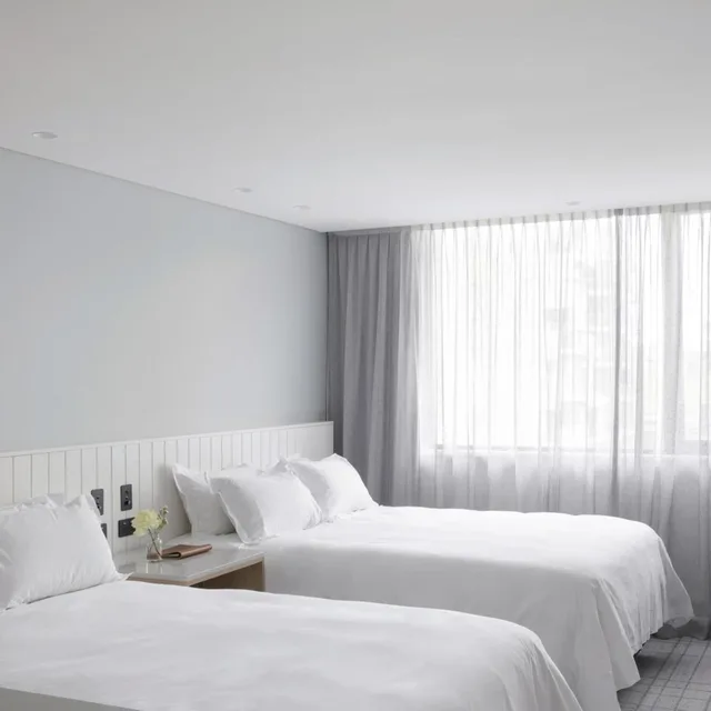 Village, Twin Beds، Elysium Manly 1/4