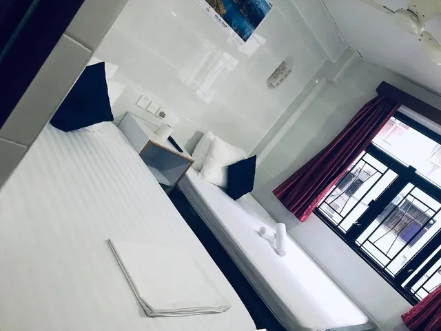 غرفة رباعية بسريرين مزدوجين، Kathmandu Guest House 1/2