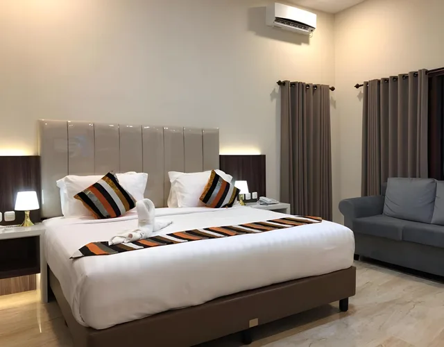غرفة بسريرين منفصلين، Grand Harvest Resort and Villas 2/2