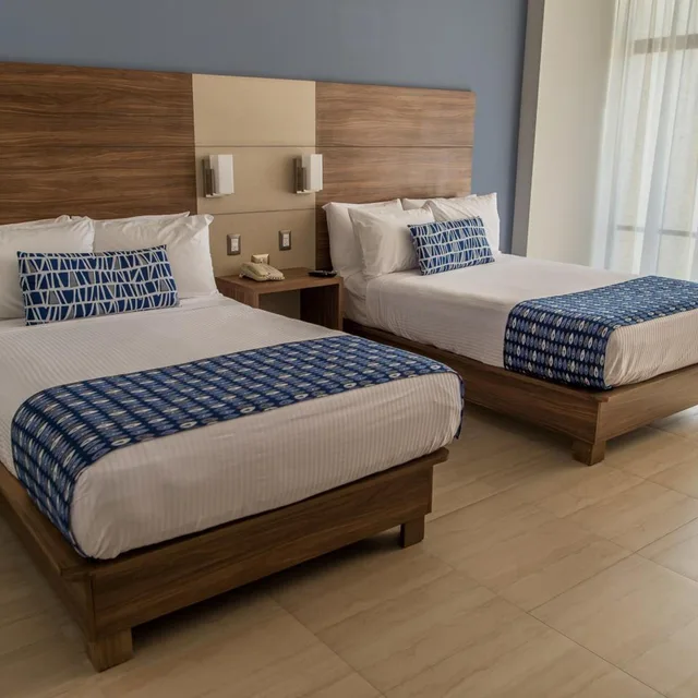 غرفة بسريرين مزدوجين بإطلالة على البحر، Ocean View Beach Hotel 2/5
