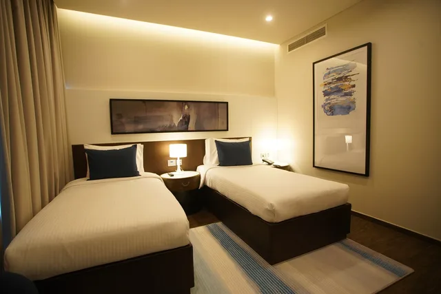غرفة ديلوكس بسرير مزدوج، C - Hotel and Suites Doha 2/2