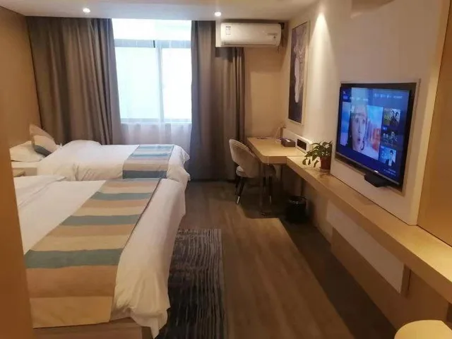 غرفة عائلية بسرير كينج وسرير فردي، VX Xuzhou Gulou District Yangshan Road Hotel 2/2