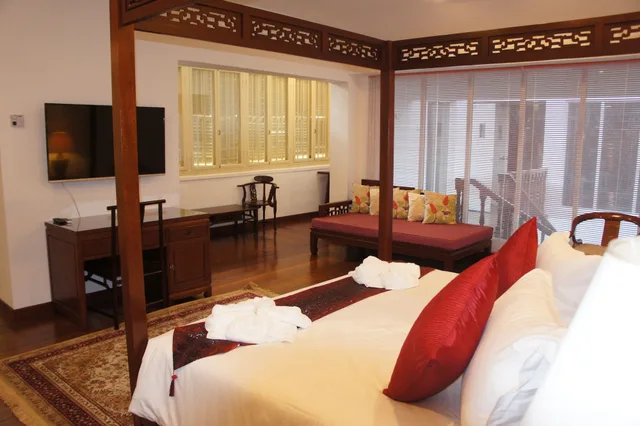 جناح غراند ديلوكس بسرير كينج، Heeren Palm Suites 1/3