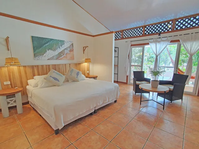 جناح عائلي بسرير كينج وسريرين مزدوجين بإطلالة على البحر، Cariblue Beach Jungle Resort 3/10