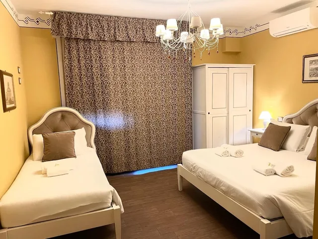 غرفة اقتصادية ثلاثية بسرير كوين وسرير فردي، Hotel Pisa Tower 1/1
