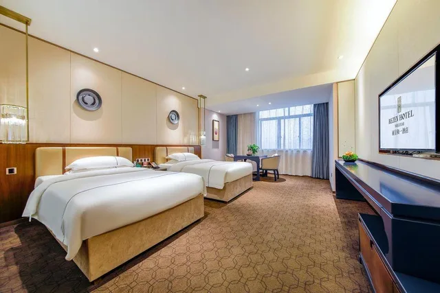 غرفة سوبيريور بسريرين منفصلين، Rezen Heyi Hotel Yizhang 1/1