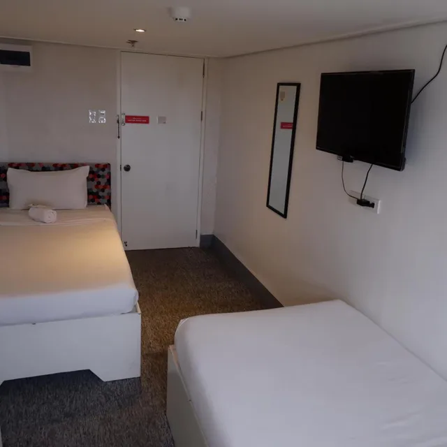 غرفة ديلوكس بسريرين منفصلين، OYO 492 Sunset View Ridge Residences 2/10