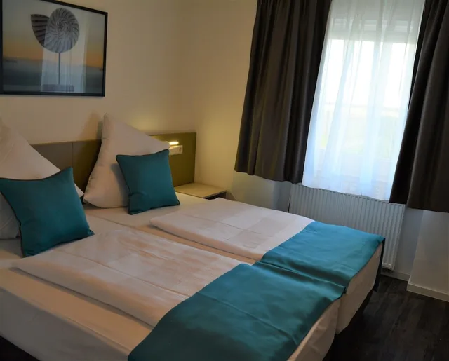 غرفة سوبيريور ثلاثية بثلاثة أسرّة، Hotel BaWu 1/3