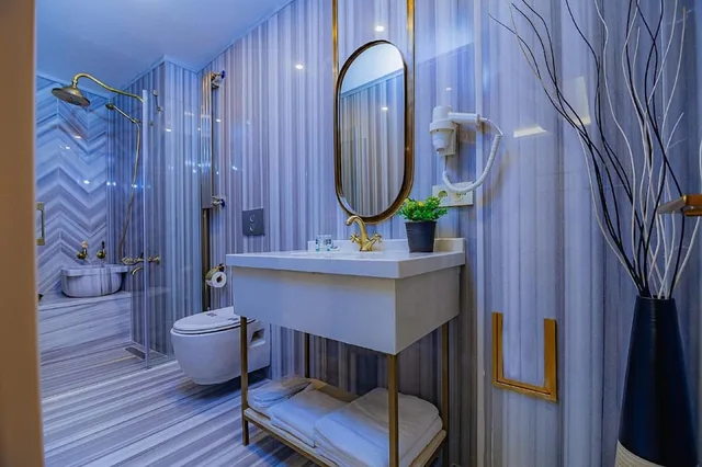 شقة تقليدية بسرير كينج مع أريكة، Comfort Beige Hotel 7/8