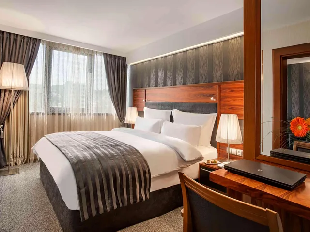 Junior Suite, King Bed, Sofa, Living Area, Hot Tub, Lane Side, Movenpick Hotel Sarajevo 1/3