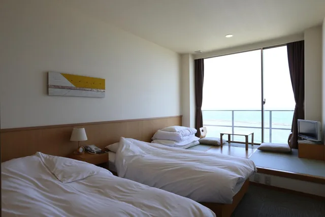 غرفة ثلاثية بإطلالة على البحر، Bayside Square Kaike Hotel 1/4