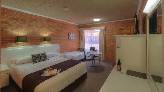 غرفة بسريرين منفصلين، COUSINS MOTOR INN 1/2