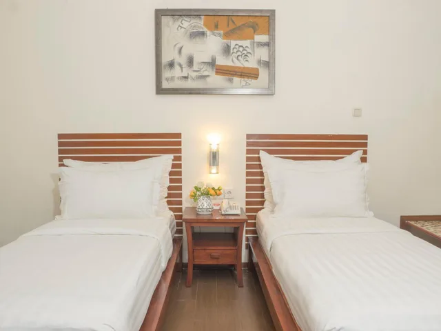 غرفة بسريرين منفصلين بحمام مشترك، d primahotel Melawai Blok M 3/5