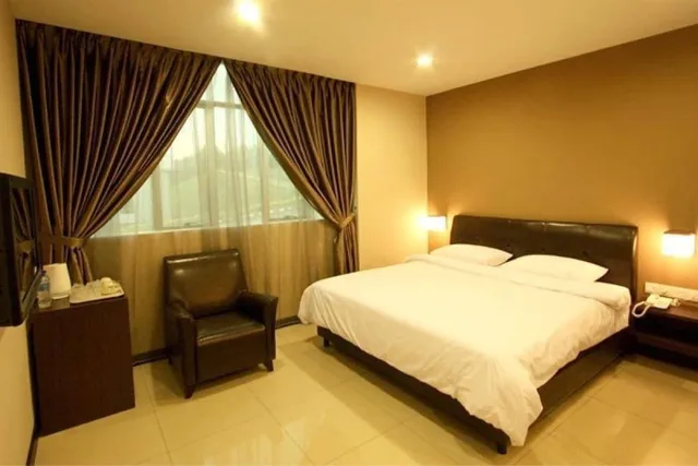 غرفة ديلوكس بسرير كينج، Capital O Rail Hotel 1/2