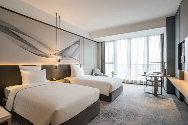 غرفة ديلوكس بسريرين منفصلين في طابق مرتفع، Pullman Jiaxing Pinghu Excellence 2/5