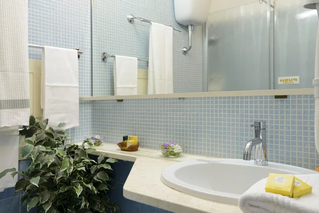 غرفة اقتصادية ثلاثية بثلاثة أسرّة، Hotel Oasis Alghero 3/4