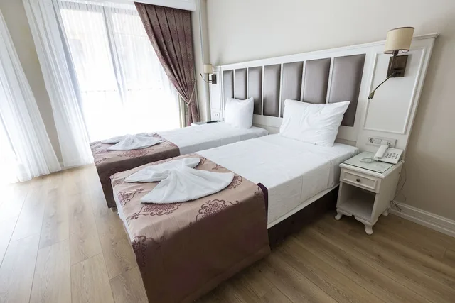 غرفة قياسية ثلاثية بثلاثة أسرّة، Villa Sweet Hotel 1/3