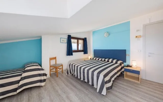 غرفة اقتصادية رباعية بسرير كوين وسريرين منفصلين، Hotel Gritti 1/2