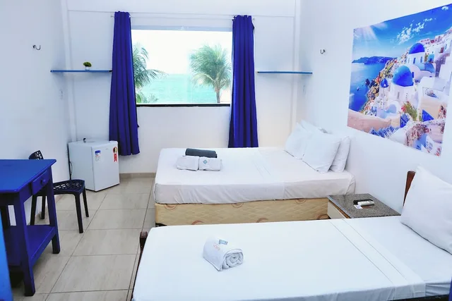 جناح ديلوكس رباعي بسريرين منفصلين، La Suite Praia 1/9