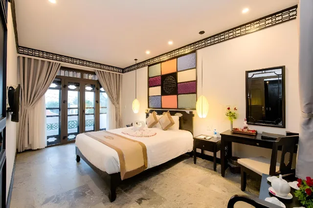 غرفة متصلة بسرير مزدوج وسريرين منفصلين، Hoi An Coco River Resort Spa 1/2