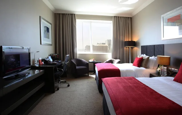 غرفة ديلوكس بسرير فردي للمدخنين، Ramada by Wyndham Abu Dhabi Downtown 1/10