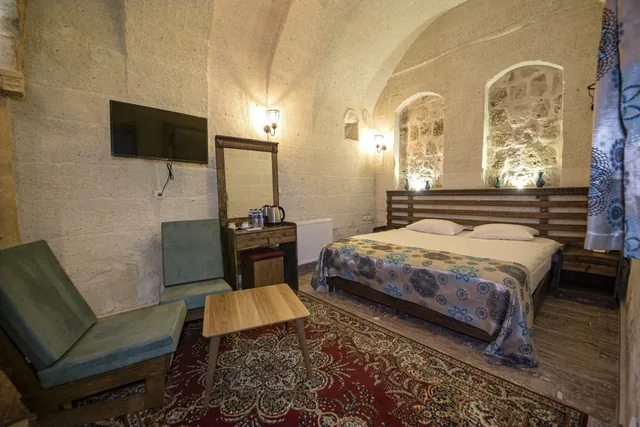 جناح ملكي بسرير كوين بحوض جاكوزي، Cappadocia Caves Hotel 1/2