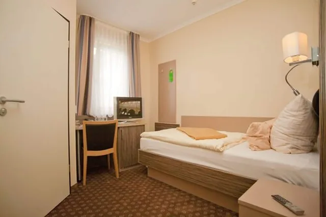 غرفة ثلاثية بسرير مزدوج وسرير فردي، City-Hotel-Bremerhaven 1/3