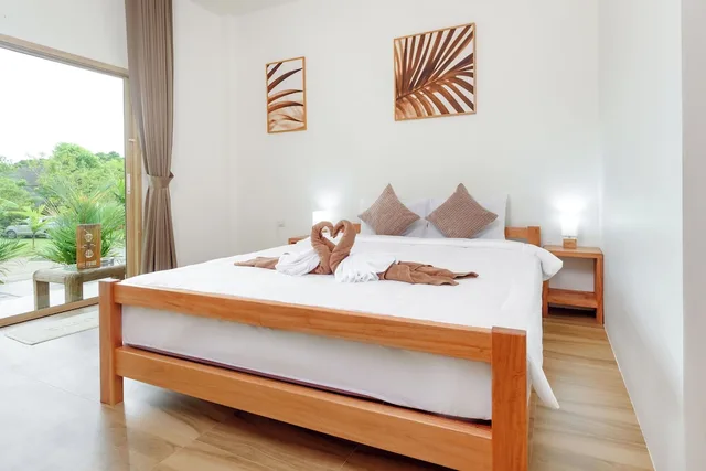 غرفة بسرير كينج بإطلالة على الحديقة، Amadha Villas Retreat 3/6