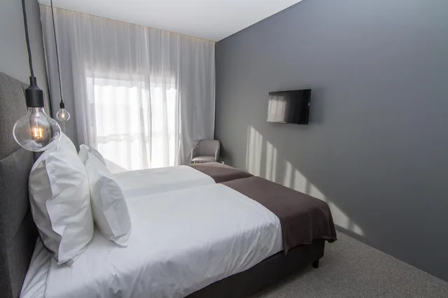 غرفة ديلوكس بإطلالة على المسبح بشرفة، Pestana Gramacho Residences 3/8