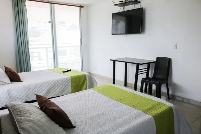 غرفة قياسية بسريرين منفصلين بإطلالة على المدينة مع أريكة، Hotel Ayenda Casa Botero 1091 3/3