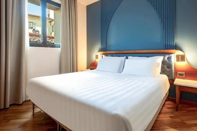 جناح استوديو سوبيريور بسرير كوين وسرير فردي، B&B Hotel Laurus al Duomo 3/8