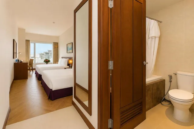 غرفة ثلاثية بسرير كوين وسرير فردي بإطلالة على المدينة، TTC Hotel - Michelia 5/7