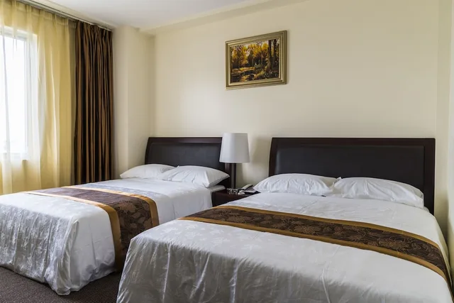 غرفة كلاسيكية بسريرين كوين، John Hotel 3/8