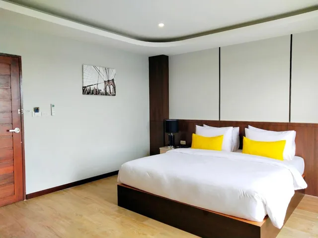 غرفة ديلوكس بسرير كينج، Koco Hotel 3/6