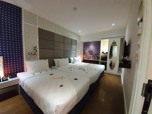 غرفة ديلوكس ثلاثية بثلاثة أسرّة، Victor Metropolis Hotel & Rooftop Bar 1/4