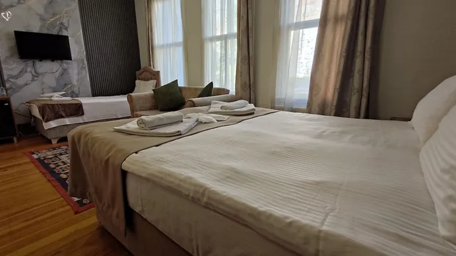 غرفة قياسية ثلاثية بسرير كوين وسرير فردي، Nuray Hotel 1/10