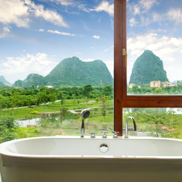 غرفة بسرير كينج بإطلالة على الجبل، Peach Blossom River Resort 7/7