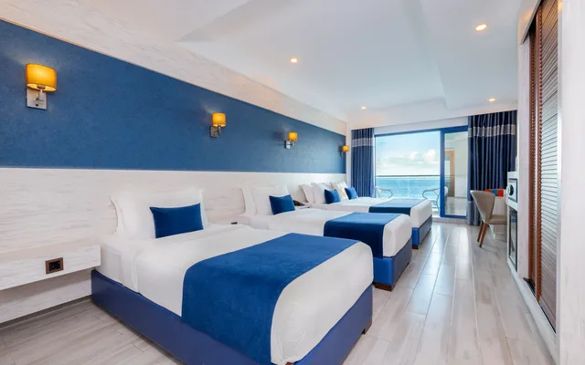 Deluxe Quadruple Room Seaview with Balcony-Transfer Excluded، Kaani Palm Beach 1/7