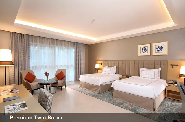 غرفة بريميوم بسريرين منفصلين وسرير كوين، Grand Cosmopolitan Hotel 1/1